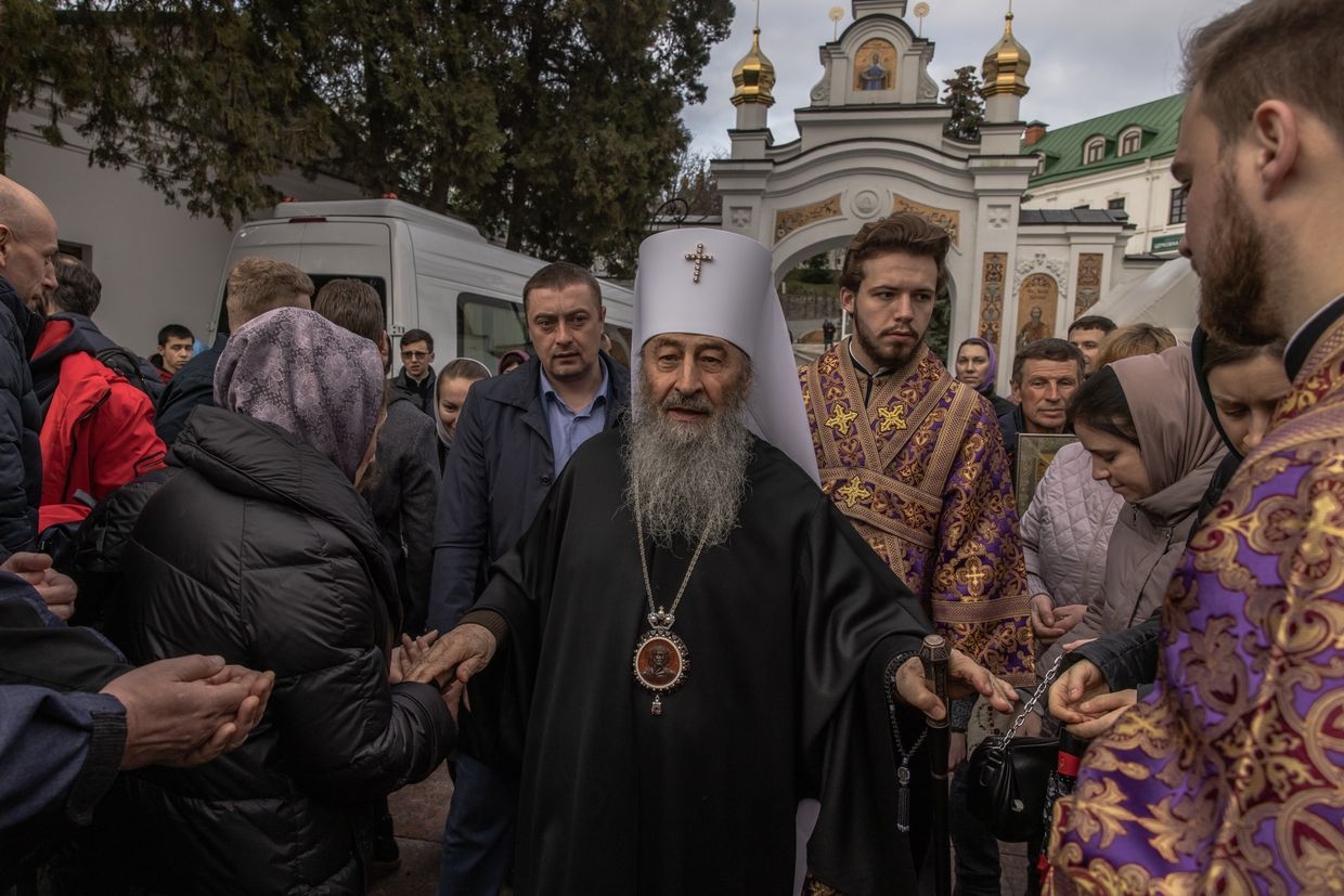 Metropolitan Onufriy (C), head of the Moscow Patriarchate's Ukrainian Orthodox Church, arrives for a Sunday service of the Ukrainian Orthodox Church (Moscow Patriarchate) at the Kyiv Pechersk Lavra in Kyiv, Ukraine, on March 26, 2023.