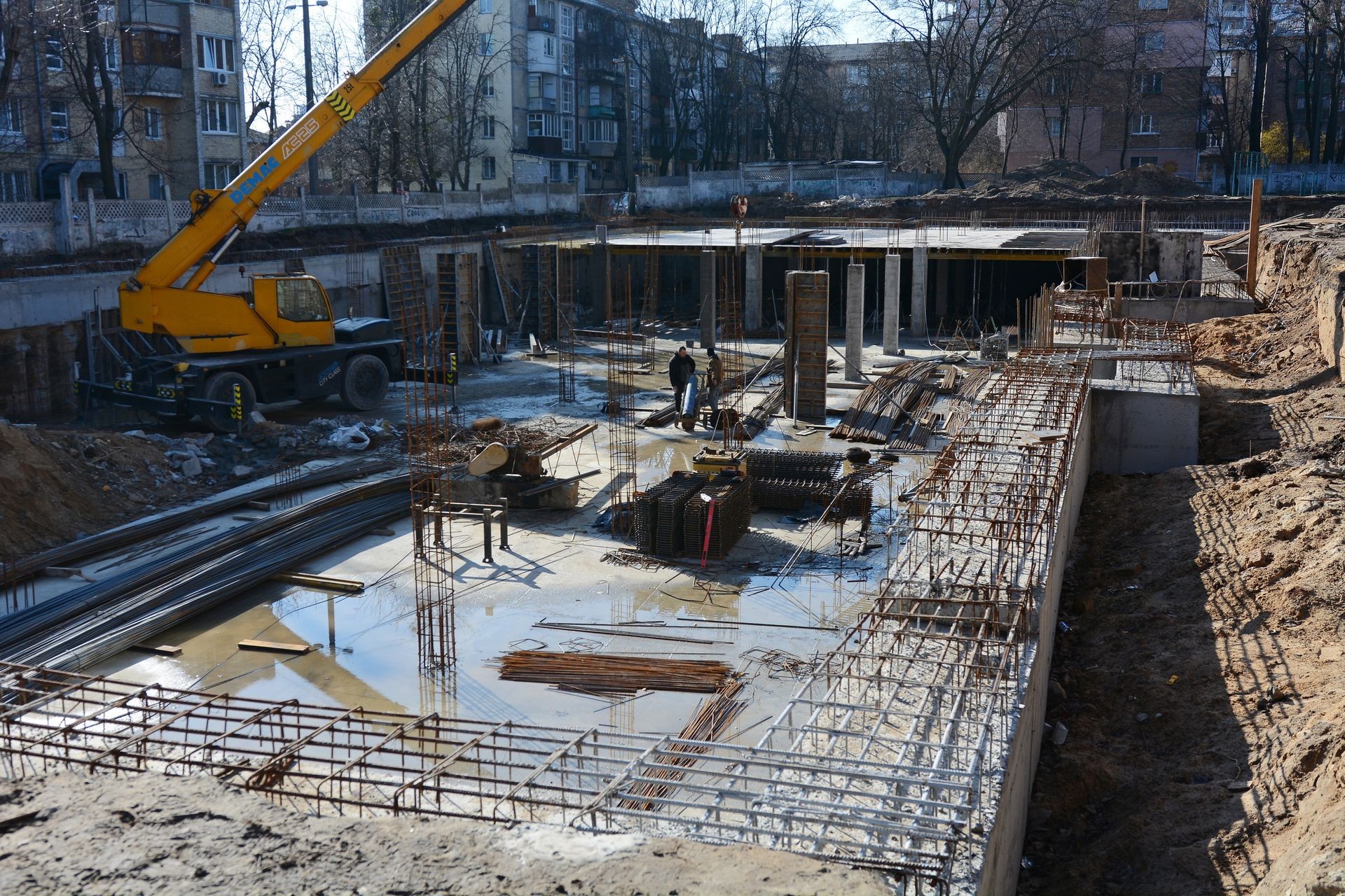 Workers build an underground bomb shelter at a school in Kyiv, Ukraine, on March 20, 2025.