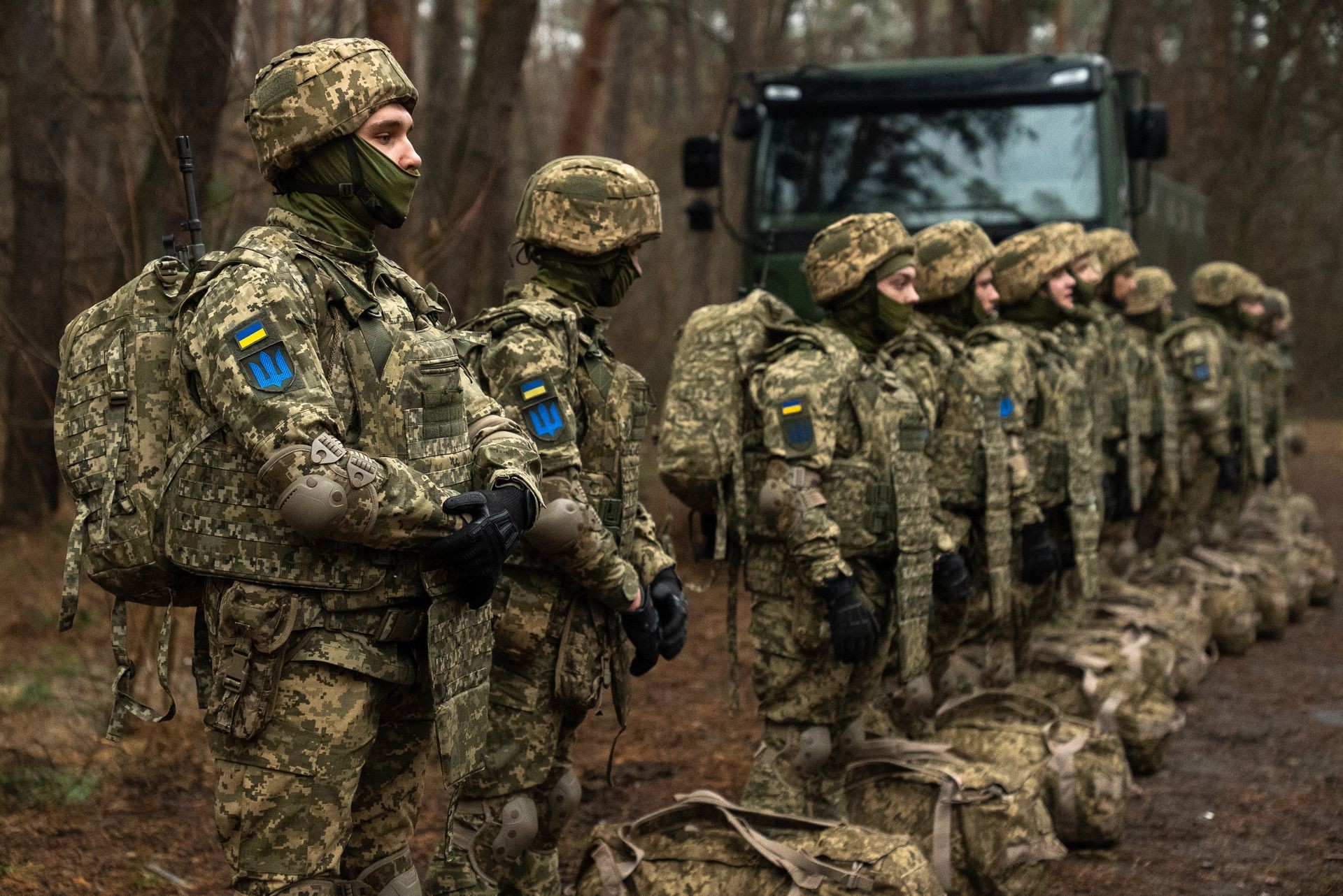 The first recruits undergo initiation in the 92nd Assault Brigade in Kharkiv Oblast, Ukraine, on March 16, 2025.
